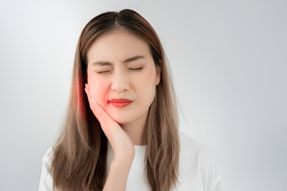 Dentist performing tooth extraction in Peterborough